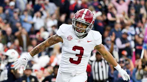 Alabama Crimson Tide wide receiver Jermaine Burton (3) celebrates his touchdown against Auburn at Jordan-Hare Stadium.